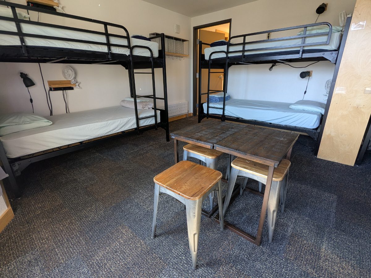 Some rooms have more traditional bunks with plenty of space for residents to sleep and work.