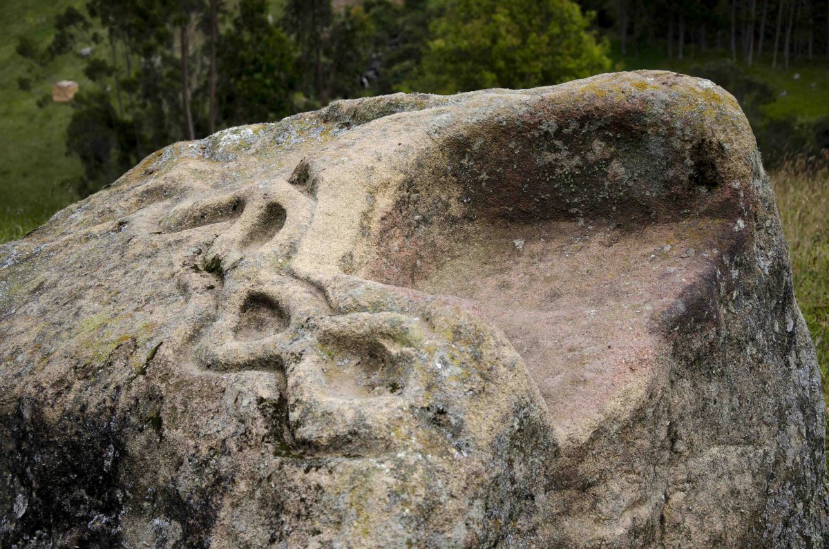 This fragment fell from the hilltop to the farmland below. It shows the intricate carving that is hard to see in the pieces that remain in situ. Fragment from Bath, Ingapirca Trail, Cañar, Ecuador