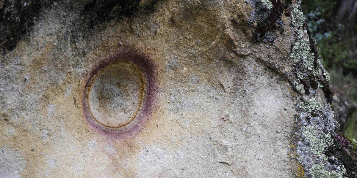 Intiñawi or the Face of the Sun is a natural formation caused by an ring of iron in the sandstone. Such formations, though often smaller, are common in the Southwest US. Intiñawi, the Face of the Sun, Ingapirca Trail, Cañar, Ecuador