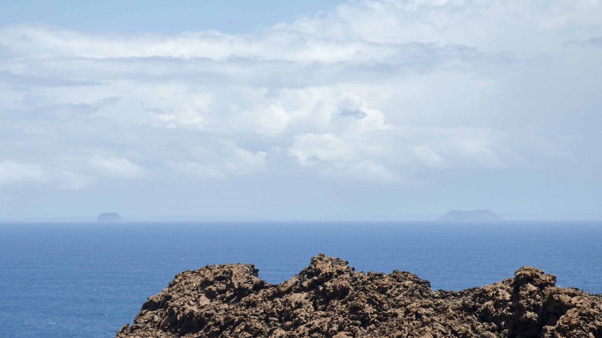 Daphnes in the Distance, seen from Bartolome Island, the Galapagos Daphnes in the Distance, seen from Bartolome Island, the Galapagos