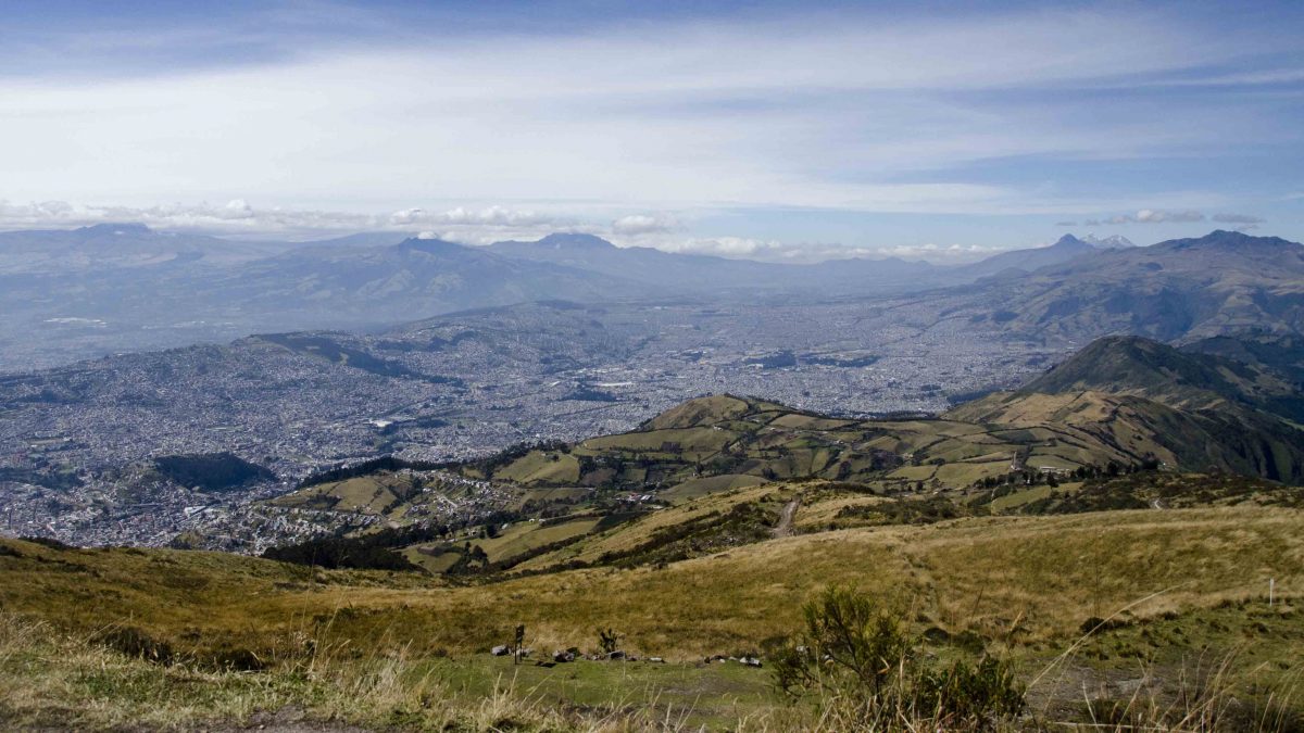 A stunning view of Quito, Ecuador from high on the slopes of the Pichincha Volcano | ©Angela Drake A stunning view of Quito and the surrounding valley from high on the slopes of the Pichincha Volcano