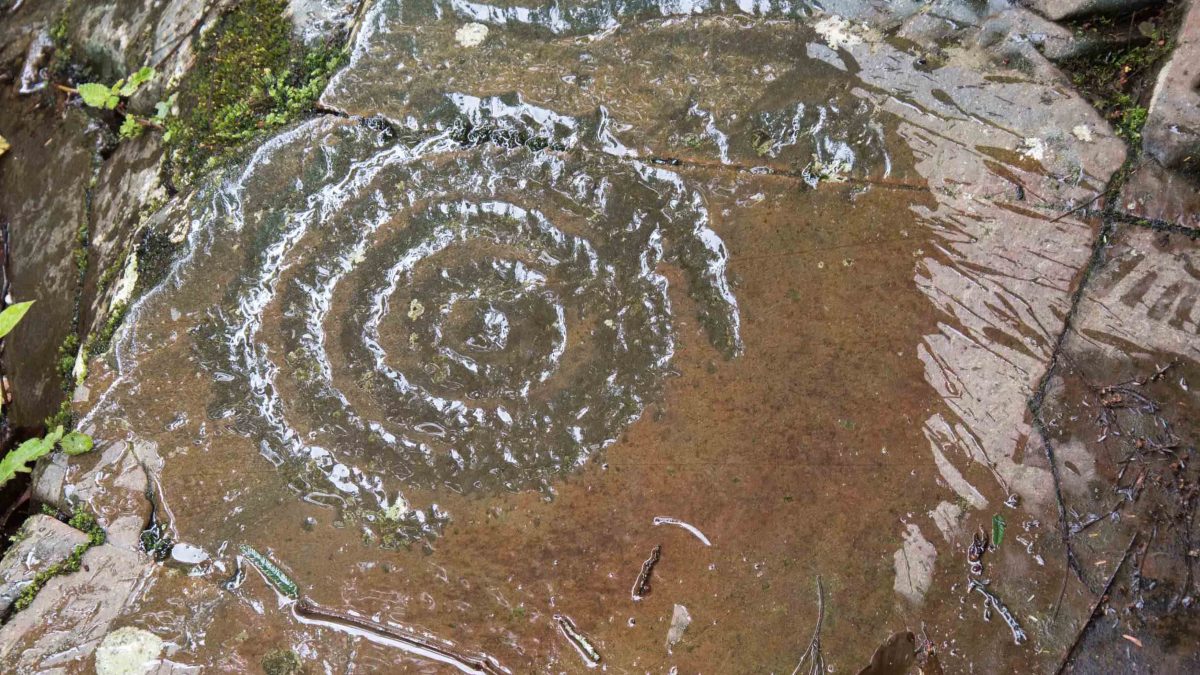 Spiral Petroglyph, Rio Chirapi, Pacto, Ecuador Spiral Petroglyph, Rio Chirapi, Pacto, Ecuador