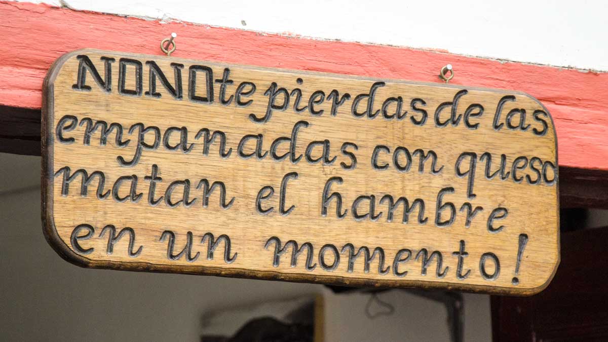 Sign outside La Casa de La Empanada, Nono, Ecuador | ©Angela Drake Sign outside La Casa de La Empanada, Nono, Ecuador | ©Angela Drake