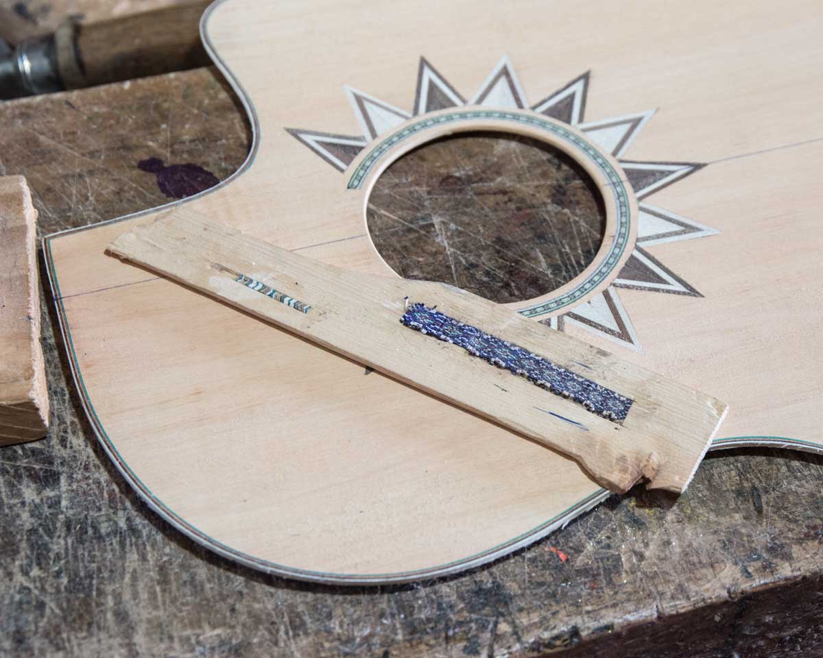 Guitar face; Uyaguari Workshop, San Bartolome, Ecuador | ©Angela Drake Guitar face; Uyaguari Workshop, San Bartolome, Ecuador | ©Angela Drake