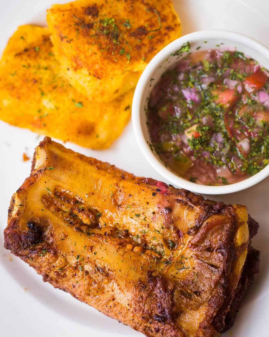 Comida Típica in Barrio La Tola, Quito, Ecuador | ©Sereno Moreno Picantería Comida Típica - ribs, potatoes, and agridulce