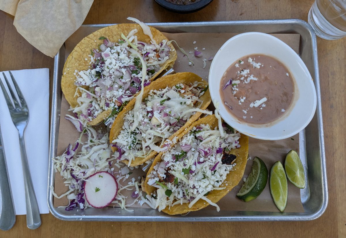 Tacos with a side of refried beans from Seis Kitchen, The Mercado, Tucson, Arizona