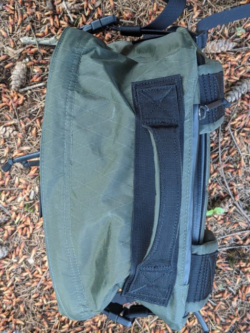 The GR3 with zipper difficult to access because of a flap of fabric in the way.